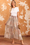 KaleaBoutique Boho Flower Print Smocked Waist Button Slit Maxi Skirt - KaleaBoutique.com