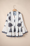 KaleaBoutique Stylish Abstract Printed Bell Sleeve Buttoned Tiered Babydoll Blouse - KaleaBoutique.com