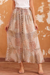 KaleaBoutique Boho Flower Print Smocked Waist Button Slit Maxi Skirt - KaleaBoutique.com