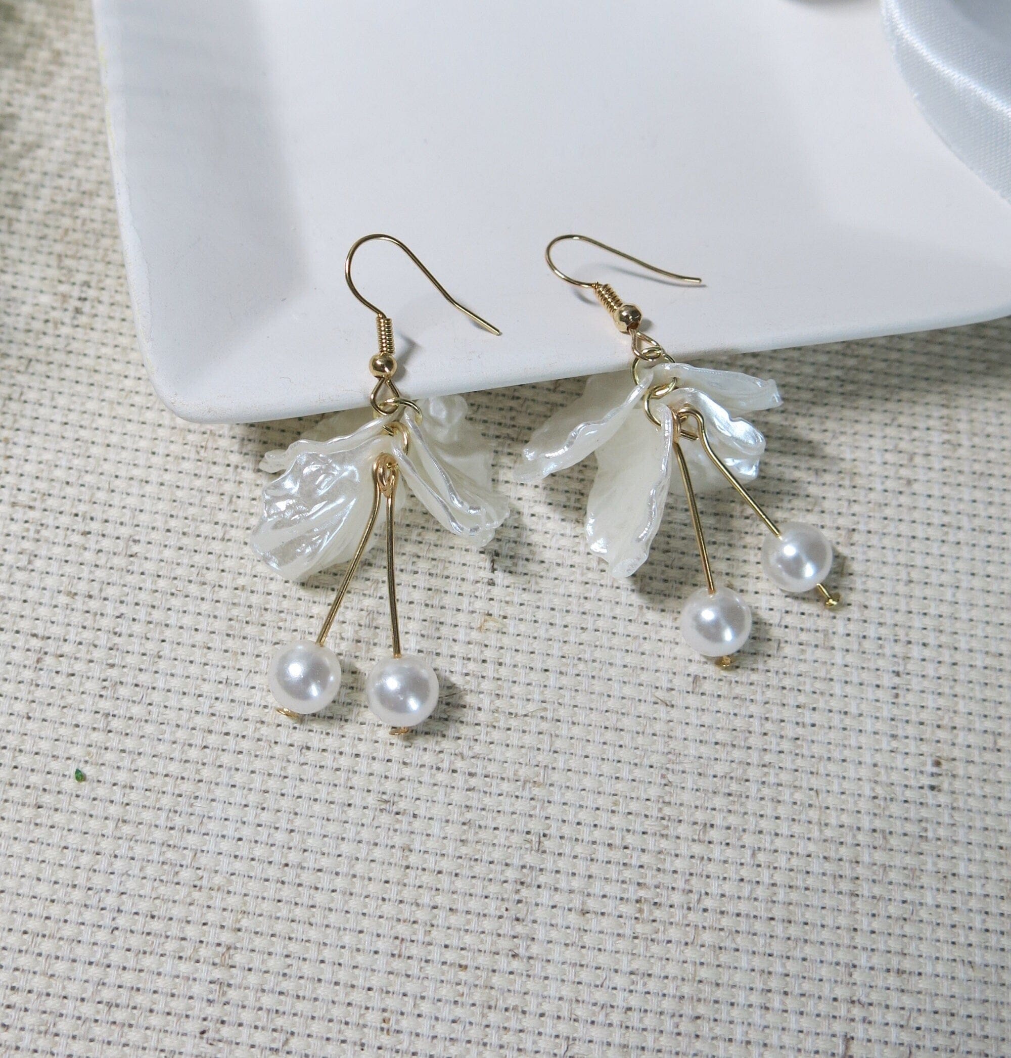 White Petal selling Earrings